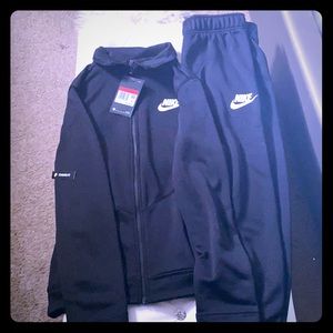 Large like new Boys black joke track suite